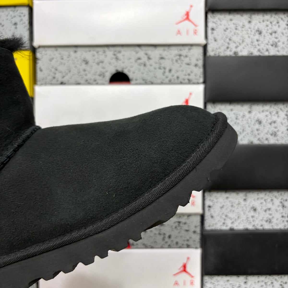 UGG Black Button Boots with Plush Trim
