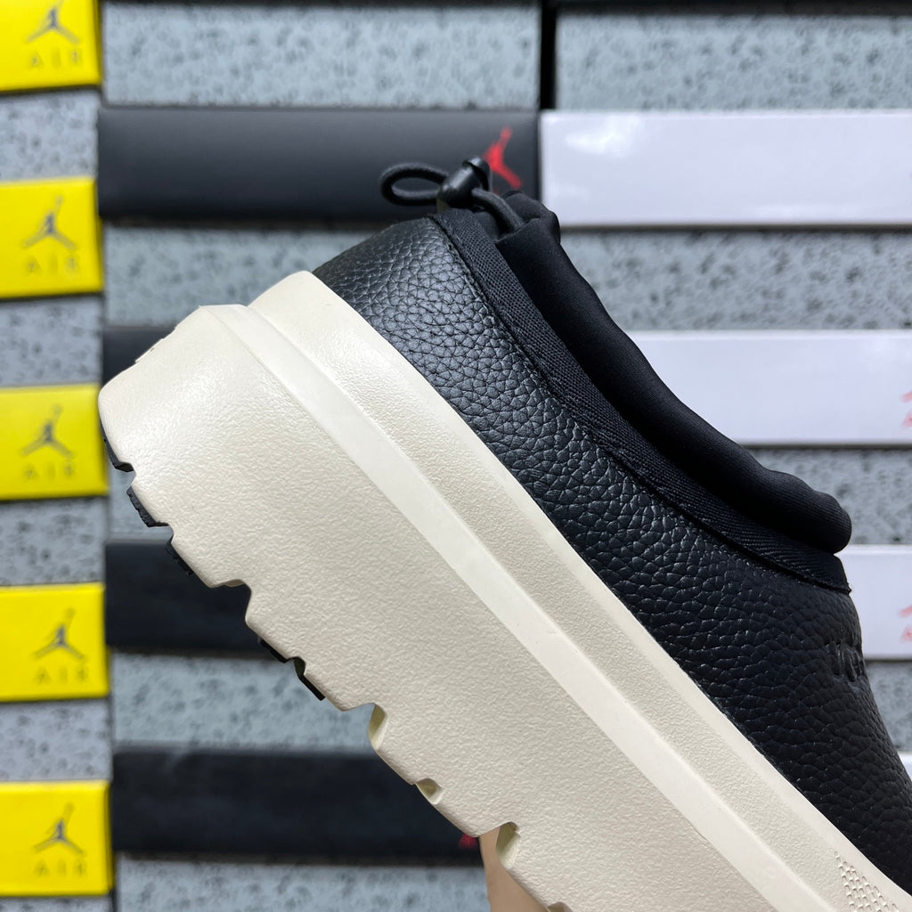 UGG Black Leather Chunky Slip-On Shoes with Cream Sole