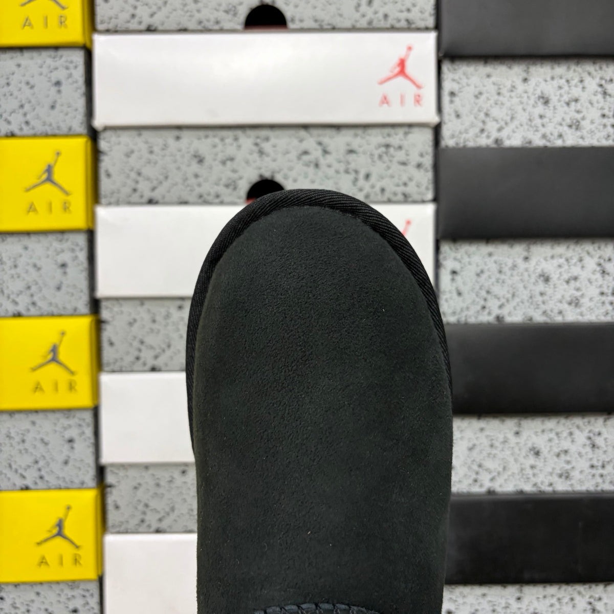 UGG Black Button Boots with Plush Trim