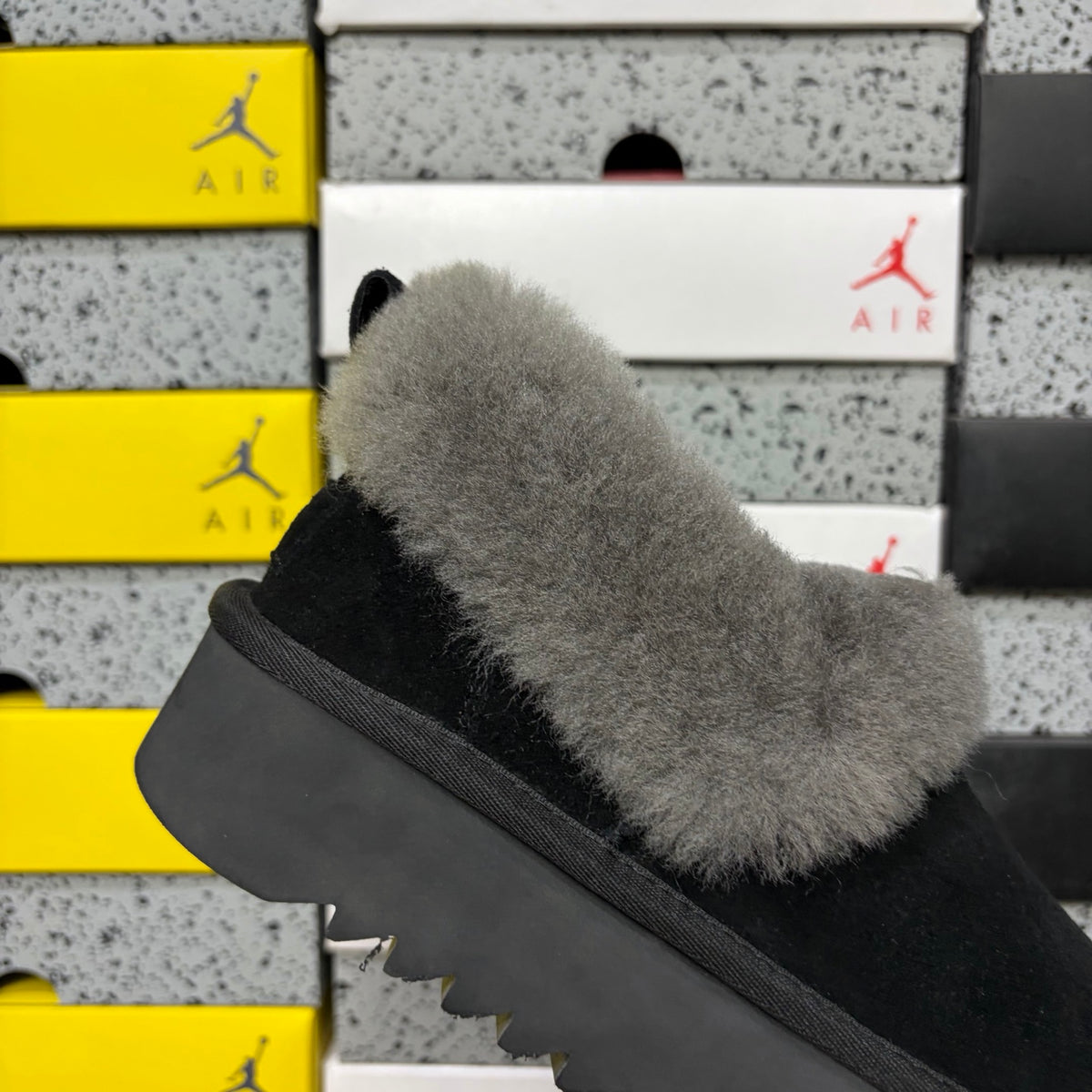 UGG Black Platform Slip-Ons with Gray Plush Collar